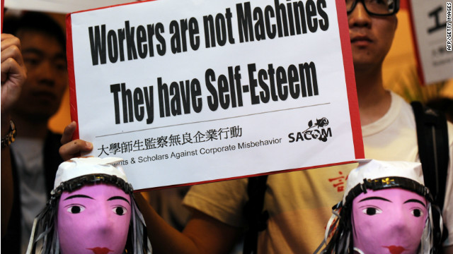 Students protest during Foxconn&#39;s annual general meeting in Hong Kong in June 2010.