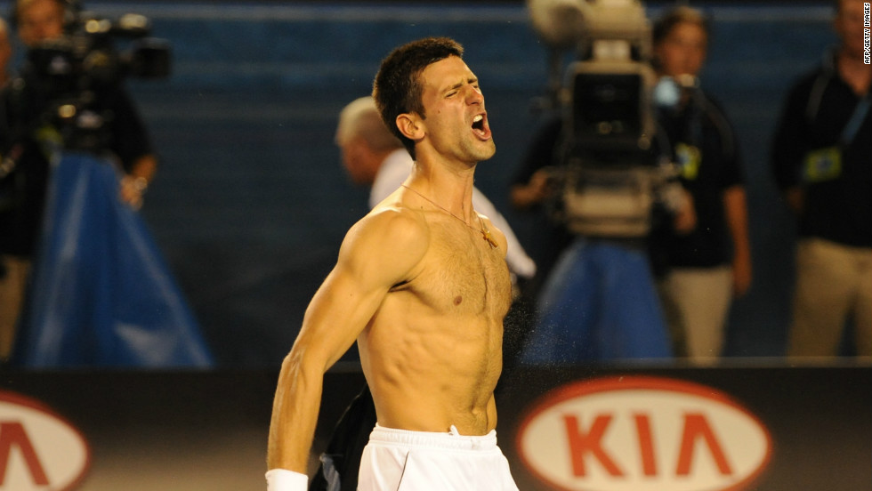 Djokovic bares his chest after completing his epic six-hour, five-set victory over Rafael Nadal to win the 2012 Australian Open title.