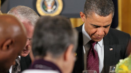 	WASHINGTON - APRIL 19: U.S. President Barack Obama (R) participates during an Easter Prayer Breakfast April 19, 2011 in the East Room of the White House in Washington, DC. Obama hosted Christian leaders from across the country for a time of prayer, reflection, and celebration of Easter. (Photo by Alex Wong/Getty Images) 