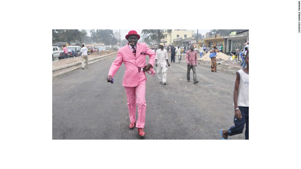 Smart suits in pastel colors are a trademark of the Brazzaville Sapeurs. 