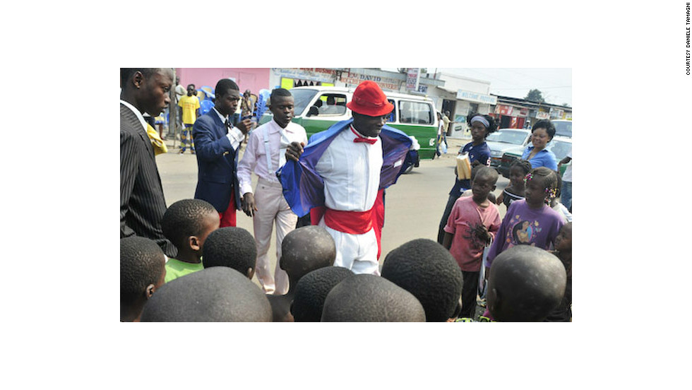 Their flamboyant dress attracts admirers of all ages.