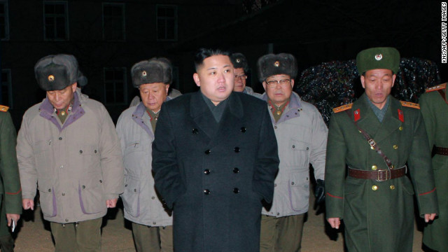 A photo released by North Korea&#39;s official news agency on Thursday shows North Korean leader Kim Jong Un, center. 