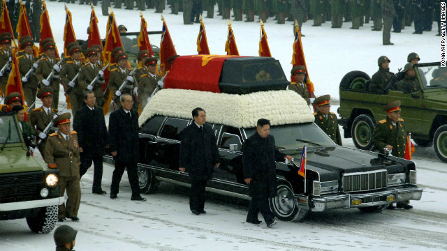 The funeral procession for North Korean leader Kim Jong Il proceeds through Pyongyang on December 28.