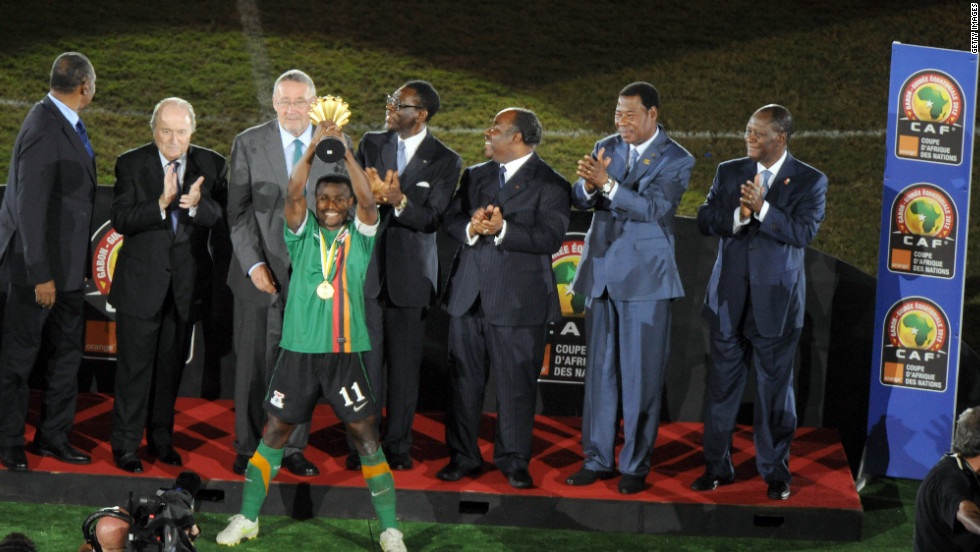 Zambia captain Christopher Katongo holds the Africa Cup of Nations trophy aloft after his team&#39;s dramatic penalty shootout victory over Ivory Coast in Libreville, Gabon.