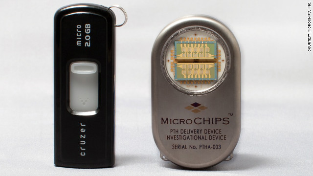 The drug delivery device (on right) is shown next to a computer flash drive.