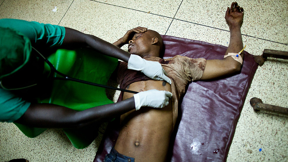 Al-Shabaab factions have carried out what appeared to many Somalis as senseless attacks. Here, a doctor treats a victim at Mulago hospital in Kampala late on July 11, 2010 after twin bomb blasts tore through crowds of football fans watching the World Cup final, killing 64 people, including an American, and wounding scores of others.