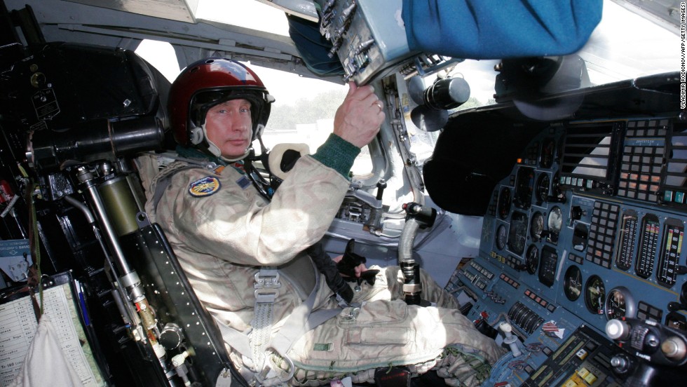 Putin in the cockpit of a Tupolev Tu-160 strategic bomber jet at a military airport on August 16, 2005, before his supersonic flight.