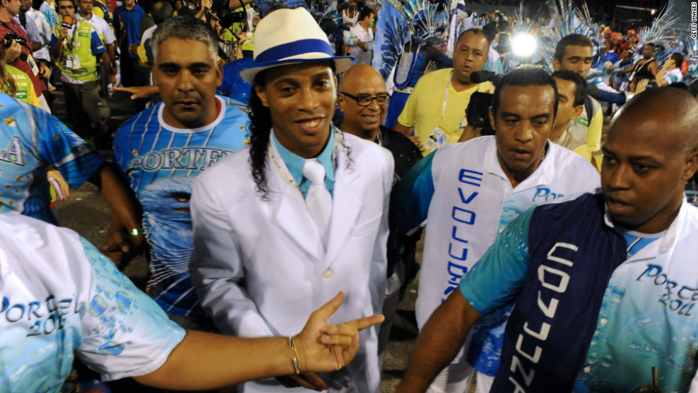 Like Neymar, Ronaldinho also enjoys letting loose during the carnival. He is pictured here dancing with a samba school in Rio during the 2011 carnival.