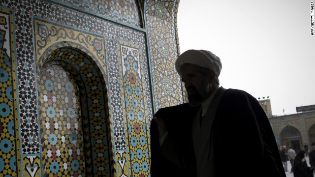 An Iranian clergyman in the courtyard of Massoumeh shrine in Qom, close to a nuclear facility.