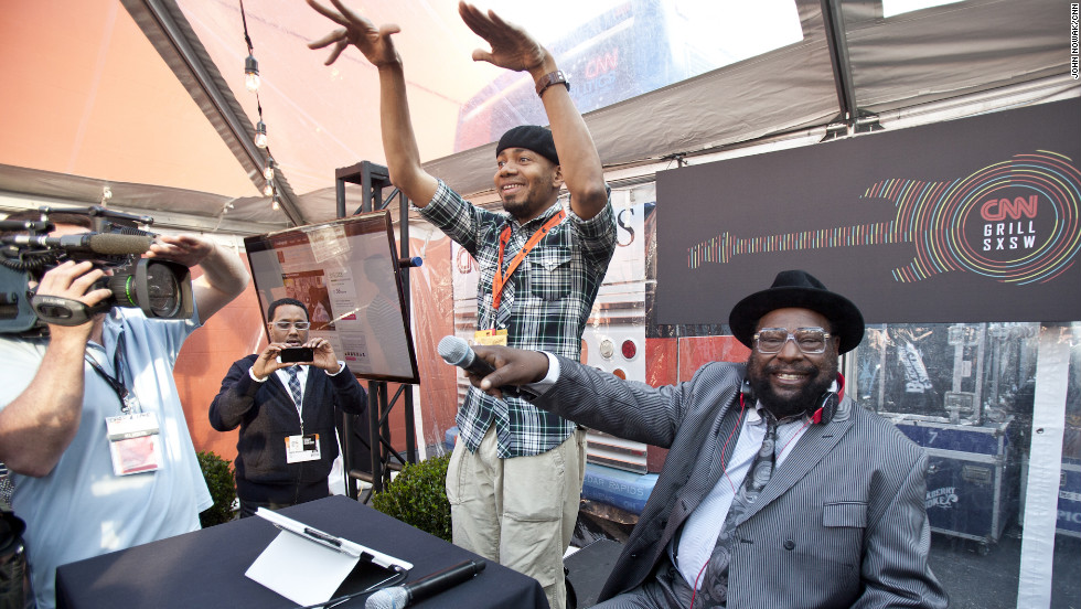 DJ Spooky and George Clinton get crowd feedback during their set Sunday.