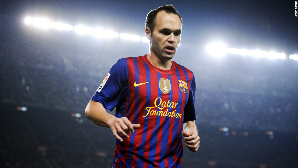 Barcelona&#39;s midfield star Andres Iniesta wears a shirt bearing the name of sponsor the Qatar Foundation. Spain&#39;s European champions had, until late 2010, never allowed such kit endorsement. 