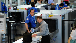  LOS ANGELES, CA - MAY 02: Transportation Security Administration (TSA) agents screen passengers at Los Angeles International Airport on May 2, 2011 in Los Angeles, California. Security presence has been escalated at airports, train stations and public places after the killing of Osama Bin Laden by the United States in Abbottabad, Pakistan. (Photo by Kevork Djansezian/Getty Images) 