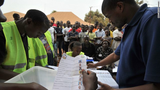 Electoral offciers count ballot papers at the polling station on March 18, 2012 in Guinea Bissau.