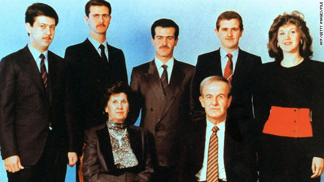 An undated photo shows former Syrian President Hafez Assad seated with his wife, Anisa. Behind them from left to right are children Maher, Bashar, Basel, Majd and Bushra.