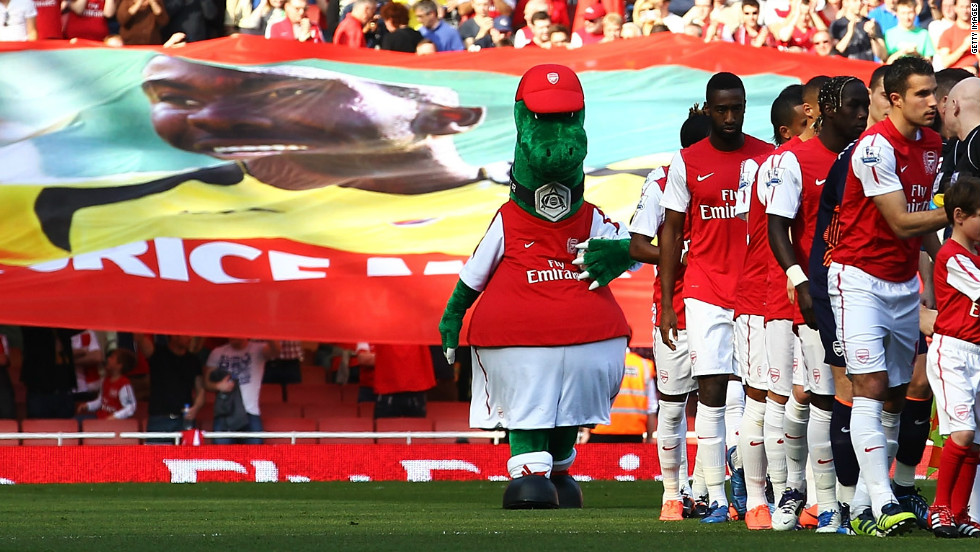 At Muamba&#39;s former club Arsenal, a banner showing an image of the midfielder was passed around before Saturday&#39;s match with Aston Villa.