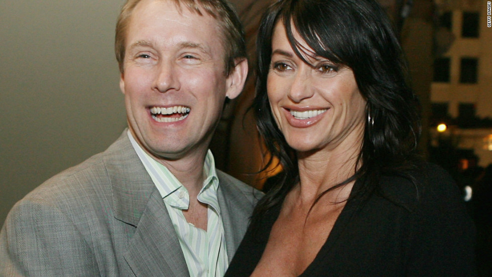 Comaneci attends a function with her husband and fellow Olympian, former U.S. gymnast Bart Conner. 