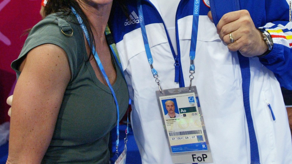 Nadia Comaneci and Romania team coach Octavian Bellu at the Athens Olympics in 2004.