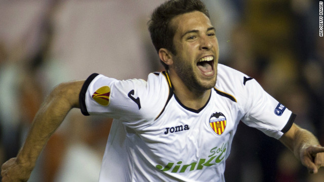 Jordi Alba celebrates after scoring as his Valencia team charged into the semifinals of the Europa League. 