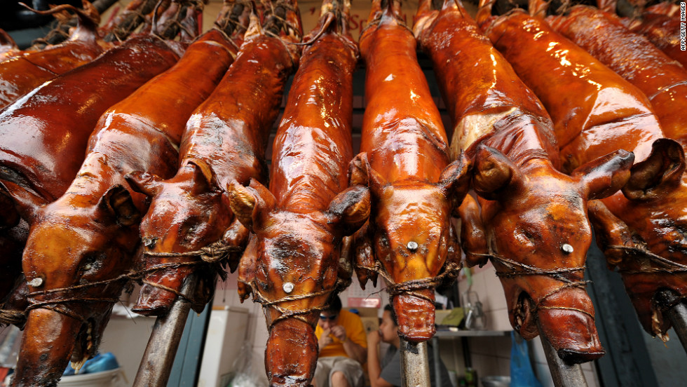 Lechon (roasted suckling pig), a holdover from Spanish colonial times, is an iconic national dish enjoyed during festivities, including weddings and Christmas celebrations.