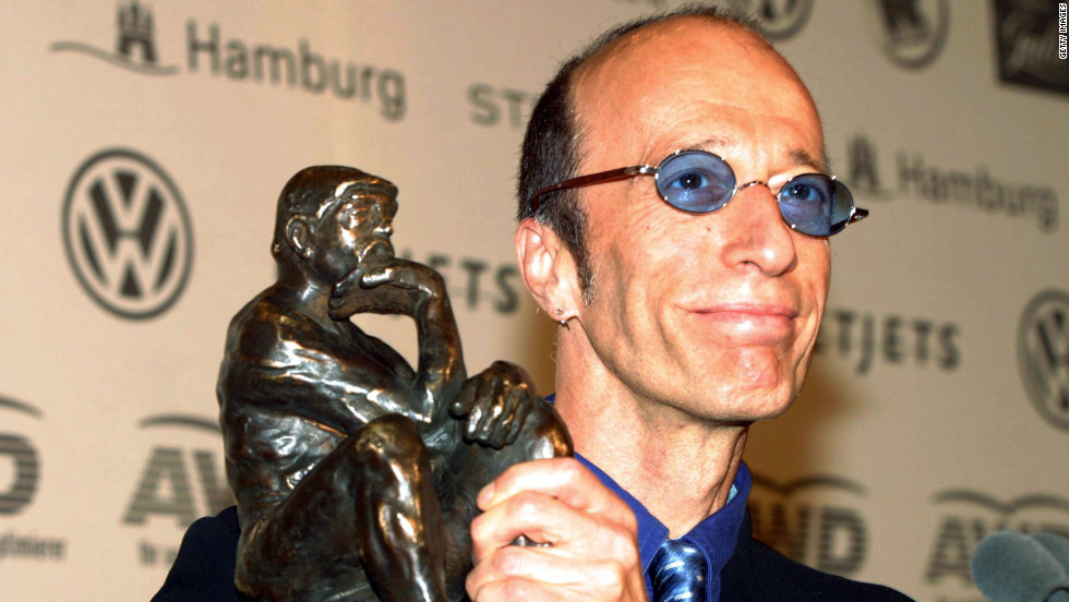 Robin Gibb displays his World Artist Award for Lifetime Achievement during the 2003 World Awards in Hamburg, Germany. Gibb accepted the award on behalf of the Bee Gees.