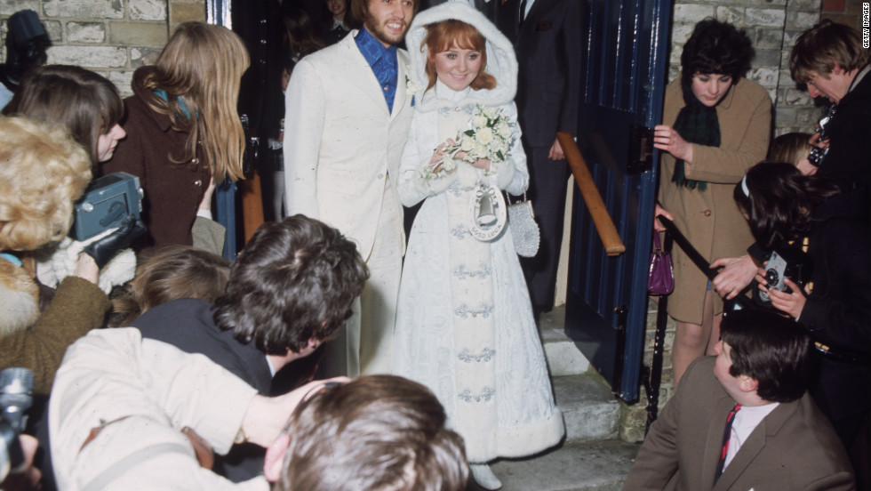 Maurice Gibb and his new bride, Scottish pop singer Lulu, exit Gerrards Cross Church in  Buckinghamshire, England, on February 18, 1969.