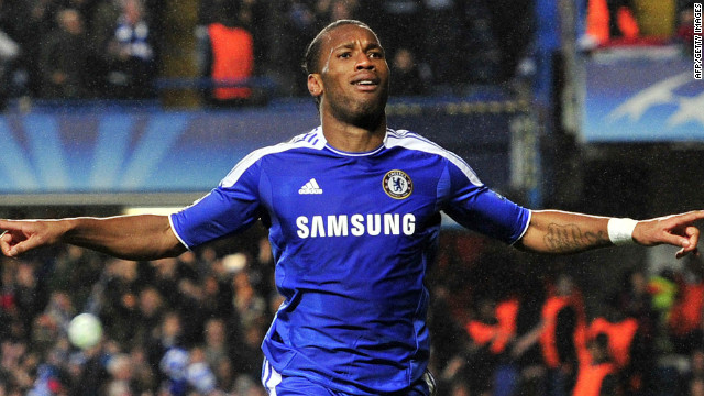 Chelsea&#39;s Didier Drogba celebrates after scoring with the last kick of the first half against Barcelona.