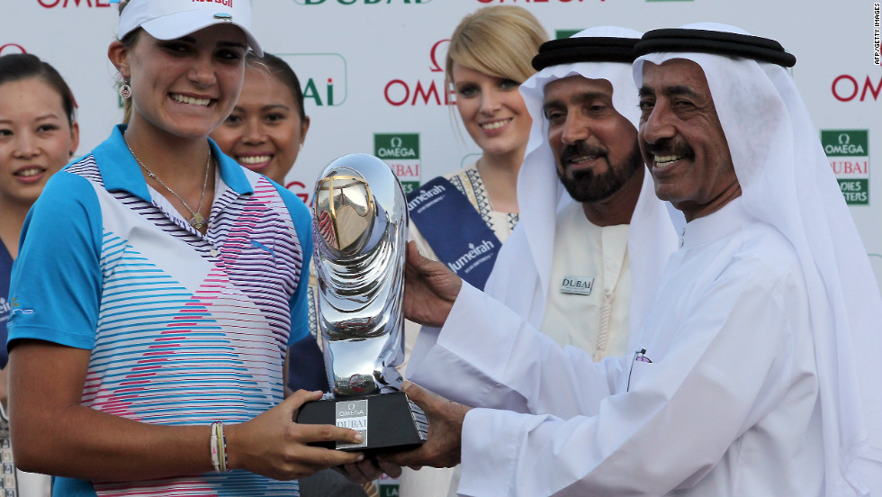 Thompson is the youngest player to win on the European Ladies&#39; Tour. Here she receives her trophy at the Dubai Ladies Masters on December 17, 2011.