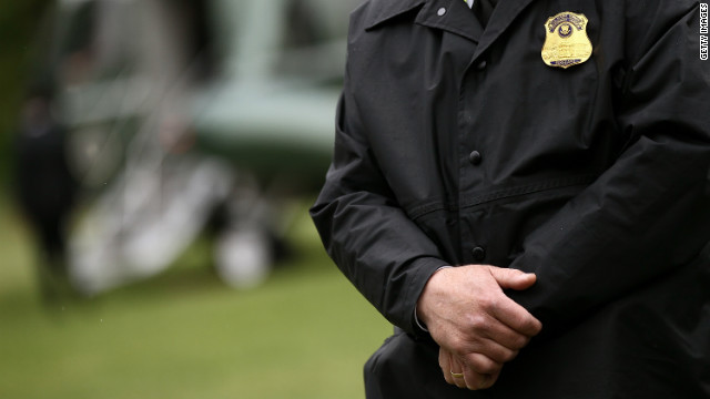 WASHINGTON, DC - APRIL 18: A member of the U.S. Secret Service Uniformed Division stands his post as U.S. President Barack Obama departs the White House on April 18, 2012 in Washington, DC. An investigation into the activities of members of the Secret Service and military personnel continues following Obama&#39;s trip to Colombia last week. (Photo by Win McNamee/Getty Images) 