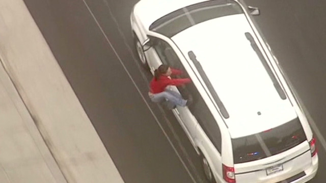 Woman Jumps Into Car During Police Chase - CNN Video