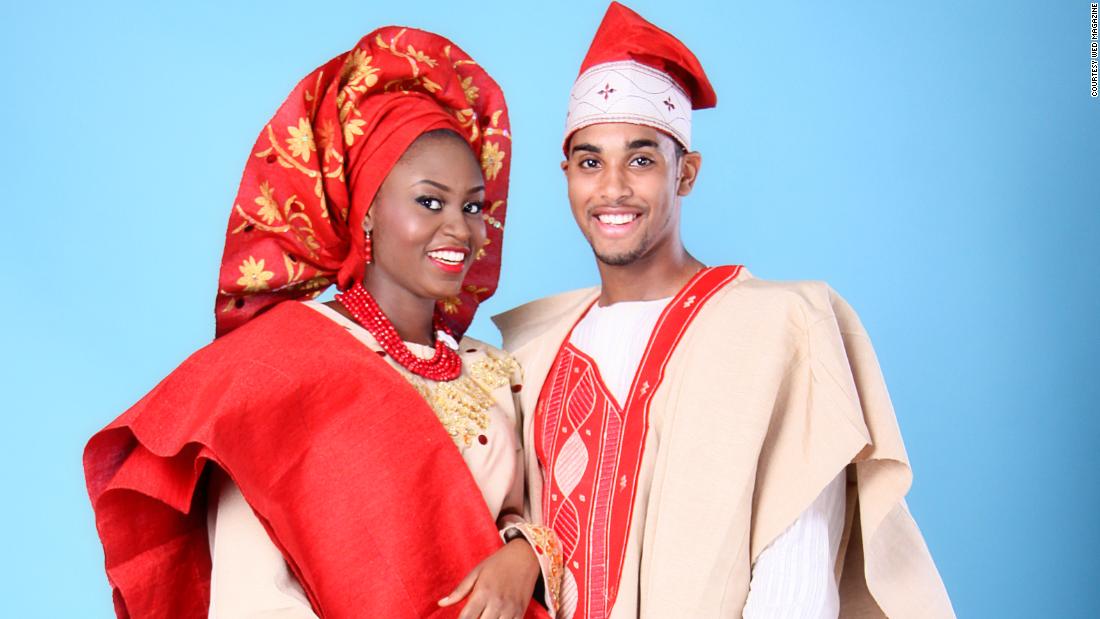 Models wear traditional Nigerian attire known as &quot;aso oke&quot; for a photo shoot for Wed Magazine. Aso-oke is hand-woven fabric worn at weddings, funerals and other formal occasions.