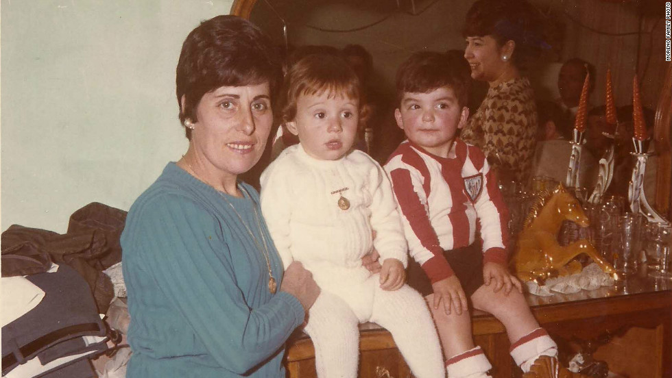 Juan Luis Moreno (center) with his mother and childhood friend Antonio Barroso, another child who was told he had been illegally adopted.