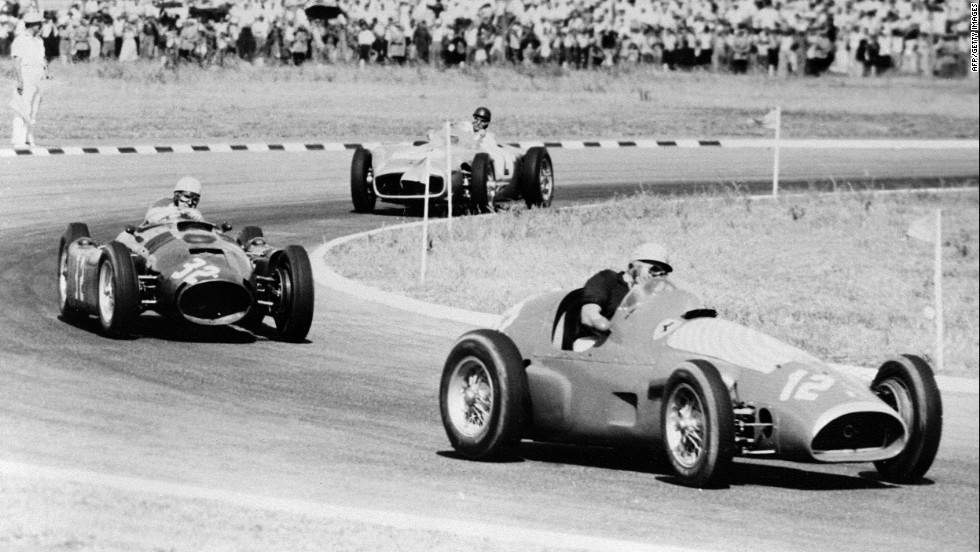 Fangio, pictured in second place, races the original Silver Arrow at the Buenos Aires track in 1955. The Argentine didn&#39;t disappoint his home crowd, later taking the title.