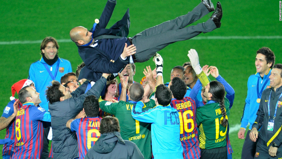 He was massively popular at the Camp Nou after four trophy-laden seasons. Here he is thrown in the air by his players after winning the FIFA Club World Cup for the second time in December 2011, having been the first team from Spain to win it two years earlier.