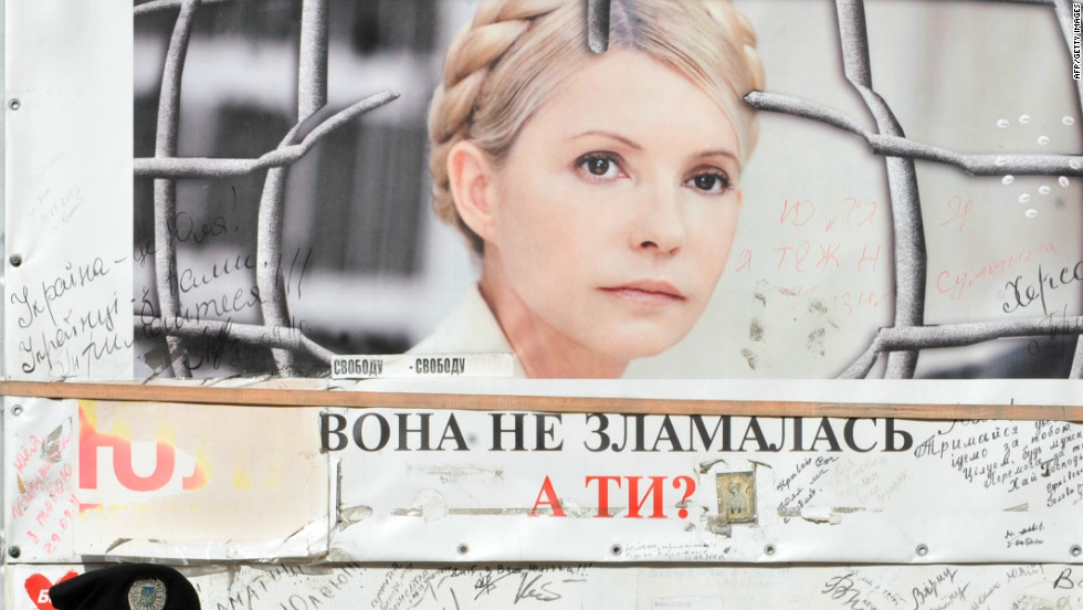 A police guard stands outside Tymoshenko&#39;s cell at the Kachanivska prison in Kharkiv. Her supporters have called on president Victor Yanukovych to quit in the wake of allegations of abuse.