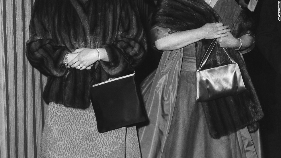 A relaxed evening at the theater: The Queen Mother and Queen Elizabeth II arrive at Windsor&#39;s Theatre Royal for a performance of George Bernard Shaw&#39;s &quot;You Never Can Tell&quot; on February 23, 1962. 