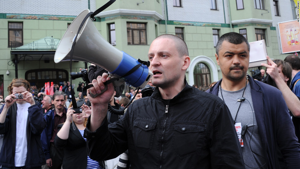 Leftist radical group leader Sergei Udaltsov, center, attends Sunday&#39;s rally. He was among the people arrested.