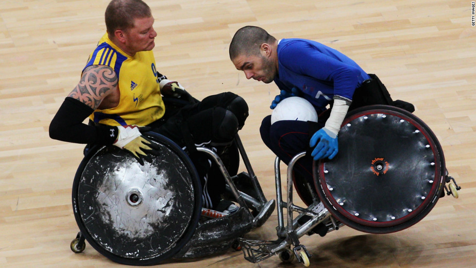 Sweden&#39;s Per-Johan Uhlmann (left) battles with Britain&#39;s Aaron Phipps during a London 2012 test event on April 18. 