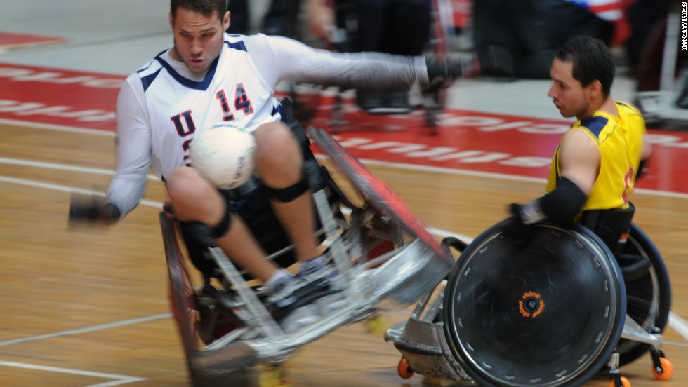 The sport is spreading around the world. Here Joseph Delagrave of the U.S. (left) collides with Colombia&#39;s Cristian Torres during the 2011 Pan American championships in Bogota.