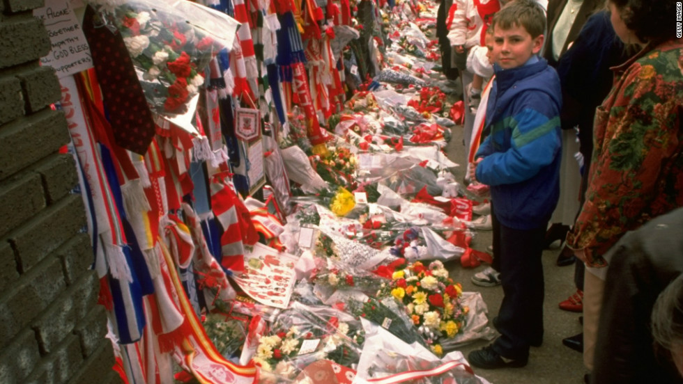 In the immediate aftermath, people from throughout Britain left tributes at Liverpool&#39;s Anfield stadium.