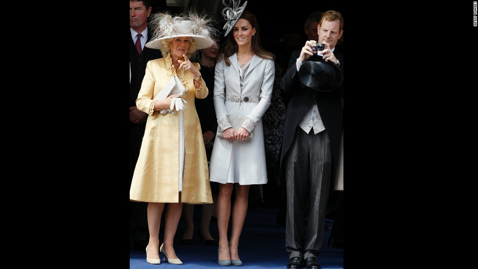 Camilla, duchess of Cornwall, and Kate attend the Order of the Garter Service on June 13 2011. Kate wore a silver coat and fascinator.