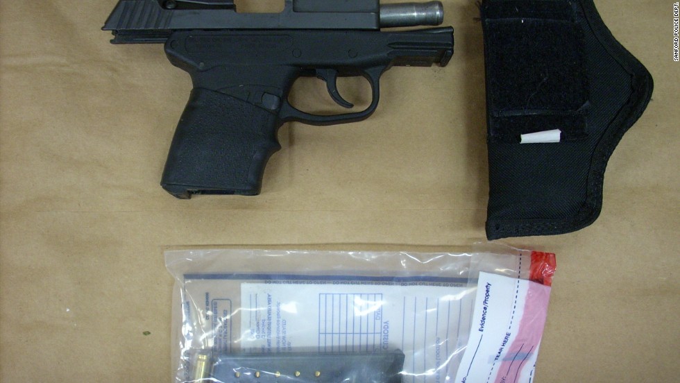 Zimmerman&#39;s gun is displayed. The shooting raised questions about gun laws, as well as the merit of the &quot;stand your ground&quot; law in Florida and similar laws in other states.