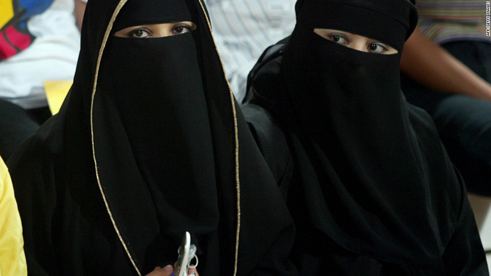 Most Emirati women wear the traditional abaya -- long, loose robes that cover the whole body -- here worn with the niqab, which covers the face.