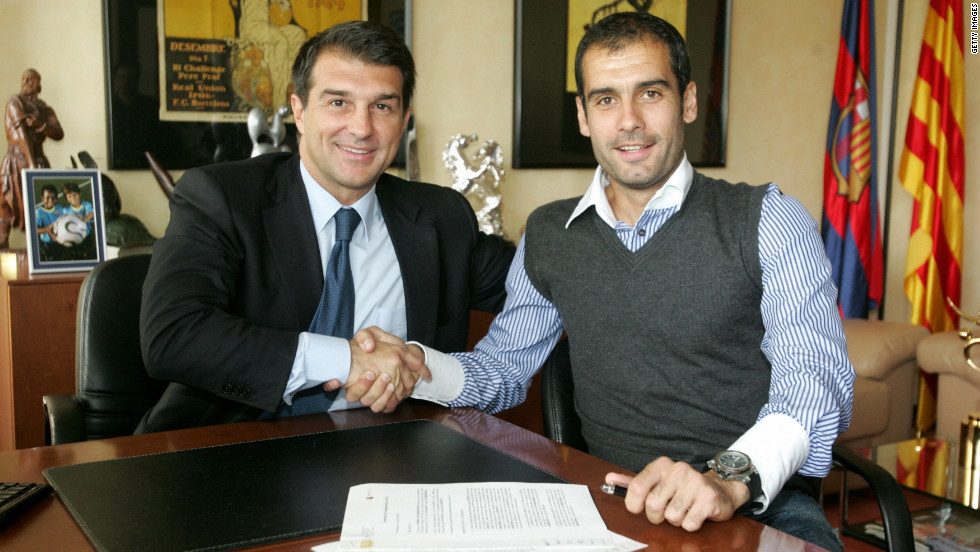 After a spell coaching Barcelona&#39;s &#39;B&#39; team, in which he delivered promotion to the second tier of Spanish football, Guardiola was handed the top job in June 2008 by then president Joan Laporta (L).