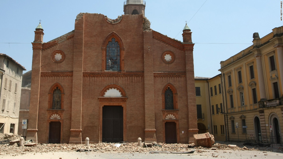 The cathedral of Mirandola is badly damaged, with large parts of it scattered across the ground. Police tape is strung across several areas of the town to prevent more casualties. 