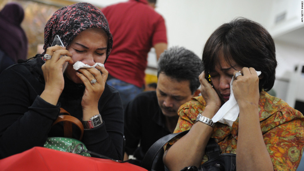 Indonesian relatives mourn at the airport in Jakarta after a Russian Sukhoi Superjet slammed into the side of a volcano on May 9, 2012. Russia&#39;s newest civilian airliner was on its second demonstration flight when the incident occurred, killing all 45 people on board.