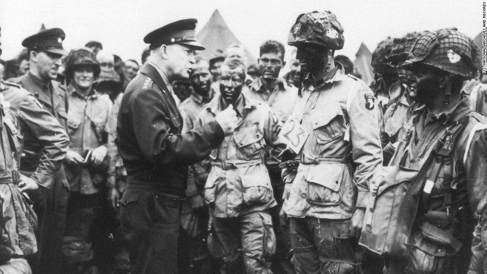 Eisenhower gives the order of the day to paratroopers in England. &quot;Full victory -- nothing else&quot; was the command just before they boarded their planes to participate in the first wave. The invasion -- code-named Operation Overlord -- had been brewing for more than two years.