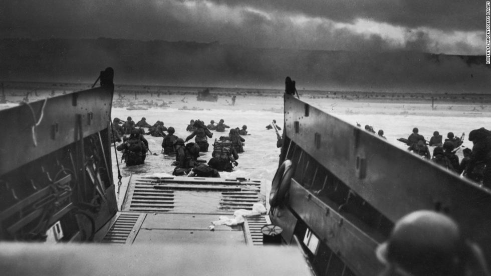 American troops storm the beaches of Normandy, France, on June 6, 1944. D-Day was the largest amphibious invasion in history. More than 160,000 Allied troops -- about half of them Americans -- invaded Western Europe, overwhelming German forces in an operation that proved to be a turning point in World War II.