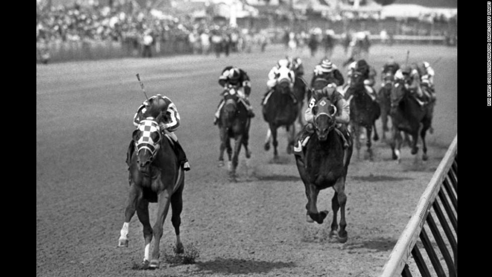 Secretariat, left, heads to victory at the Kentucky Derby in 1973. Considered by many to be the greatest racehorse of all time, Secretariat still holds the record for the fastest times in all three Triple Crown races. He won the Belmont by an astounding 31 lengths.