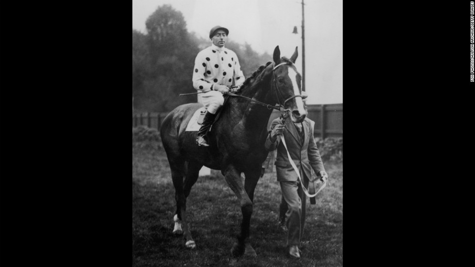 Jockey Pat Beasley rides Omaha in 1936. The horse won the Triple Crown in 1935.