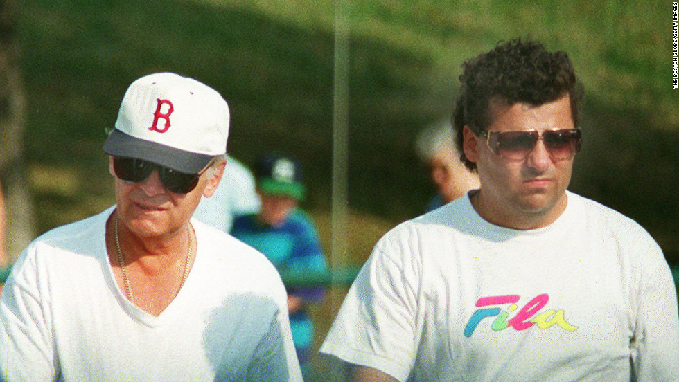 Bulger, left, walks with his onetime friend and confidant Kevin Weeks in Boston in 1994. Weeks later turned on his former boss. In 2000, Weeks led police to the bodies of eight alleged Bulger victims buried around Boston. 